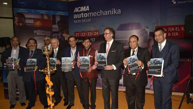 Industry leaders unveiling a report titled ‘The Indian Automotive Aftermarket Study’ by ACMA, at the third edition of ACMA Automechanika New Delhi, on Tuesday.(Handout Photo)