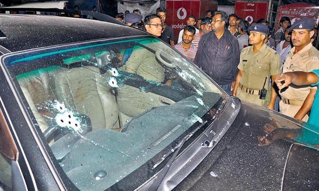 Motorcycle-borne assailants intercepted Dhanbad’s former deputy mayor Neeraj Singh’s SUV and opened fire. The incident took place barely 100m from his home.(Bijay/HT Photo)