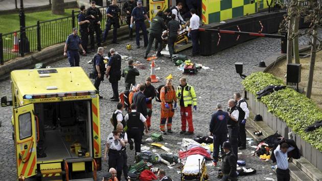 Emergency services at the scene outside the Palace of Westminster, London, Wednesday, March 22, 2017. London police say they are treating a gun and knife incident at Britain's Parliament "as a terrorist incident until we know otherwise.(AP Photo) Emergency services at the scene outside the Palace of Westminster, London, Wednesday, March 22, 2017. London police say they are treating a gun and knife incident at Britain's Parliament "as a terrorist incident until we know otherwise.(AP Photo)