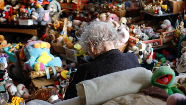 Belgian Catherine Bloemen, sits among more than 20,000 stuffed and plastic toys. (Yves Herman / Reuters) Belgian Catherine Bloemen, sits among more than 20,000 stuffed and plastic toys. (Yves Herman / Reuters)