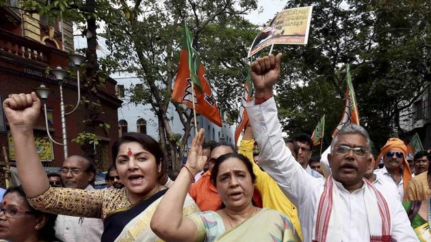 BJP leaders holding a protest demonstration against the West Bengal government over the Narada scam in Kolkata on Wednesday. (PTI photo) BJP leaders holding a protest demonstration against the West Bengal government over the Narada scam in Kolkata on Wednesday. (PTI photo)