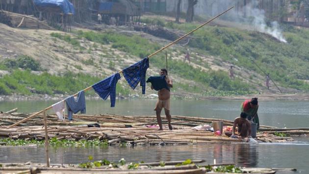 People wash clothes on the banks of the river Brahmaputra in Guwahati on March 21, 2017, on the eve of World Water Day. (Biju BORO / AFP) People wash clothes on the banks of the river Brahmaputra in Guwahati on March 21, 2017, on the eve of World Water Day. (Biju BORO / AFP)