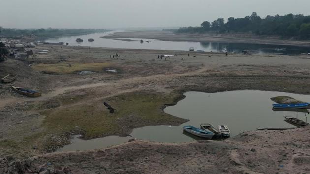Boats are seen parked alongside a patch of river on the outskirts of Lahore, ahead of World Water Day. International World Water Day is marked annually on March 22 to focus global attention on the importance of water. (ARIF ALI / AFP) Boats are seen parked alongside a patch of river on the outskirts of Lahore, ahead of World Water Day. International World Water Day is marked annually on March 22 to focus global attention on the importance of water. (ARIF ALI / AFP)