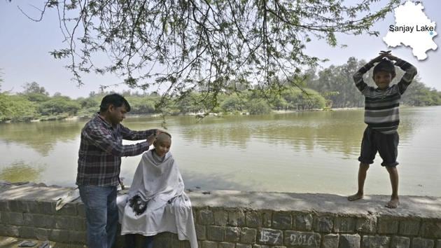 Sanjay Lake is an artificial lake developed by Delhi Development Authority (DDA) at Trilokpuri in East Delhi, adjoining Mayur Vihar II residential area. These water bodies, if reclaimed, could have helped against declining groundwater reserves and recharge aquifer and sustain tube wells operation in nearby areas. (Arun Sharma/HT PHOTO) Sanjay Lake is an artificial lake developed by Delhi Development Authority (DDA) at Trilokpuri in East Delhi, adjoining Mayur Vihar II residential area. These water bodies, if reclaimed, could have helped against declining groundwater reserves and recharge aquifer and sustain tube wells operation in nearby areas. (Arun Sharma/HT PHOTO)
