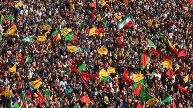 Turkish Kurds gather to celebrate Newroz at Diyarbakir. In a sign of the tensions, police opened fire on a man carrying a knife and a rucksack who did not obey a request to have his bag searched as he entered the designated area and shouted he was carrying a bomb. (Ilyas Akengin/AFP) Turkish Kurds gather to celebrate Newroz at Diyarbakir. In a sign of the tensions, police opened fire on a man carrying a knife and a rucksack who did not obey a request to have his bag searched as he entered the designated area and shouted he was carrying a bomb. (Ilyas Akengin/AFP)