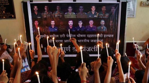 School students pay tributes to army soldiers killed in the Uri terror attack, in Thane. An NIA report concludes that it was the LeT and not the Jaish which was involved in the attack. (PTI) School students pay tributes to army soldiers killed in the Uri terror attack, in Thane. An NIA report concludes that it was the LeT and not the Jaish which was involved in the attack. (PTI)
