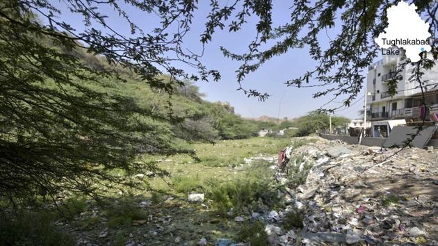 Sewer carrying chemical waste from Tughlaqabad Village Lake in New Delhi. In June 2016, the National Green Tribunal also directed the Delhi government to clean and restore all the natural water bodies. (Arun Sharma/HT PHOTO) Sewer carrying chemical waste from Tughlaqabad Village Lake in New Delhi. In June 2016, the National Green Tribunal also directed the Delhi government to clean and restore all the natural water bodies. (Arun Sharma/HT PHOTO)