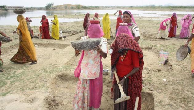 Women work at a MNREGA site in western Rajasthan.(HT File Photo) Women work at a MNREGA site in western Rajasthan.(HT File Photo)