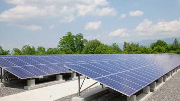 Solar panels installed atop a building.(HT Photo) Solar panels installed atop a building.(HT Photo)