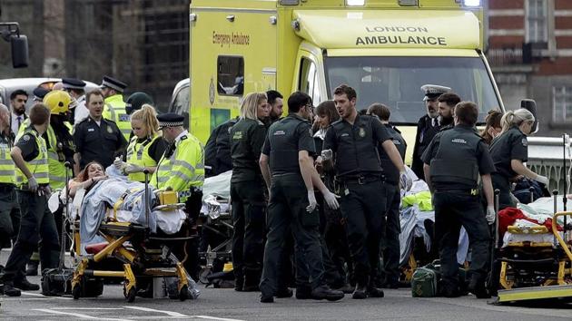 Emergency services staff provide medical attention close to the Houses of Parliament in London, Wednesday, March 22, 2017. London police say they are treating a gun and knife incident at Britain's Parliament "as a terrorist incident until we know otherwise." (AP Photo) Emergency services staff provide medical attention close to the Houses of Parliament in London, Wednesday, March 22, 2017. London police say they are treating a gun and knife incident at Britain's Parliament "as a terrorist incident until we know otherwise." (AP Photo)
