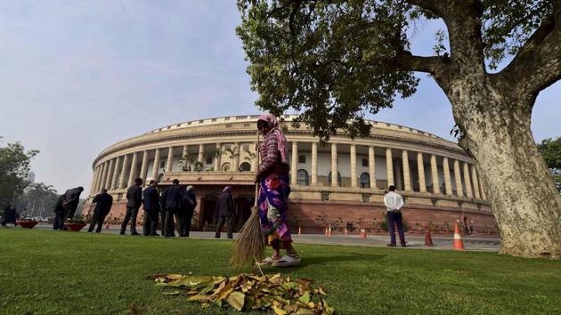 A sweeper works at Parliament during the budget session in New Delhi.(PTI) A sweeper works at Parliament during the budget session in New Delhi.(PTI)