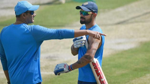 India cricket team skipper Virat Kohli and coach Anil Kumble have a chat during nets session in Dharamsala on Thursday, ahead of the fourth Test vs Australia cricket team which begins on Saturday.(PTI)