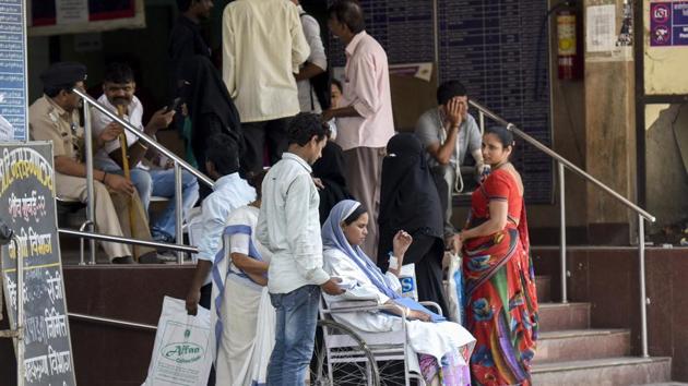 Patients and their relatives neat the OPD at Sion Hospital in Mumbai on Wednesday. (Kunal Patil/HT Photo) Patients and their relatives neat the OPD at Sion Hospital in Mumbai on Wednesday. (Kunal Patil/HT Photo)