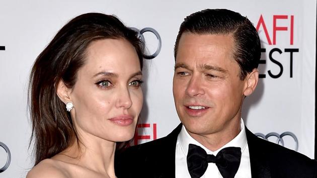 This file photo taken on November 4, 2015 shows actor/director Angelina Jolie Pitt (L) and her estranged husband actor Brad Pitt as they arrive at the AFI FEST 2015. (AFP)