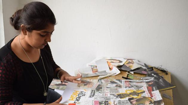 A girl taking part in poster making competition during the inter college cultural fest at Saint Soldier College, in Jalandhar. (Sikander Singh Chopra/Hindustan Times )