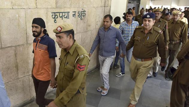 A Gurgaon district court awarded a life sentence to 13 people last Saturday. Four convicts were given five years’ imprisonment and most of them have already spent about 4 years in jail as undertrials. (Sanjeev Verma/HT PHOTO) A Gurgaon district court awarded a life sentence to 13 people last Saturday. Four convicts were given five years’ imprisonment and most of them have already spent about 4 years in jail as undertrials. (Sanjeev Verma/HT PHOTO)