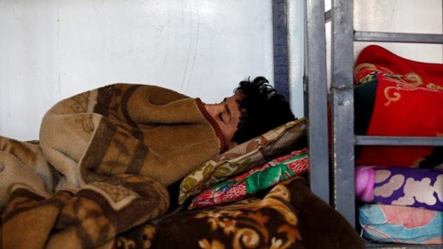 A boy sleeps at The al-Shawkani Foundation for Orphans Care in Sanaa. (Khaled Abdullah / Reuters) A boy sleeps at The al-Shawkani Foundation for Orphans Care in Sanaa. (Khaled Abdullah / Reuters)