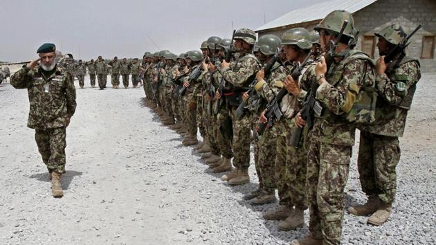 File photo of Afghan National Army soldiers in Sangin district of southern Afghanistan. Afghan officials said on March 23, 2017 that the Taliban have captured Sangin. The taking of Sangin district, once considered the deadliest battlefield for British and US troops in Afghanistan, marks the culmination of the insurgents' year-long push to expand their footprint.(AP)