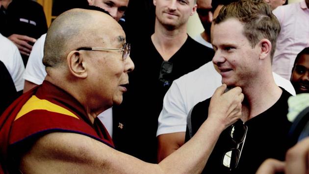 The Dalai Lama interacts with Australian cricket team captain Steve Smith. (PTI) 