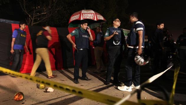Bangladeshi policemen investigate the area where a suicide bomber detonated himself in Dhaka, Bangladesh, Friday, March 24, 2017. (AP Photo) Bangladeshi policemen investigate the area where a suicide bomber detonated himself in Dhaka, Bangladesh, Friday, March 24, 2017. (AP Photo)