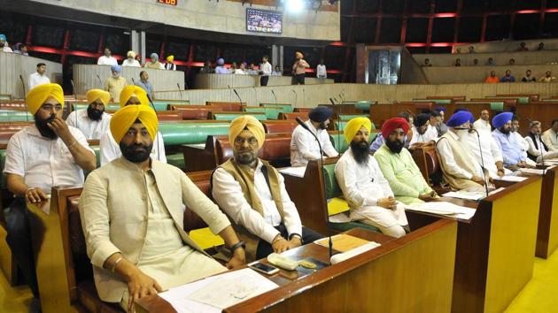 AAP MLAs in the Punjab Vidhan Sabha on the first day of the maiden session of the 14th assembly on Friday, March 24. (Keshav Singh/HT)