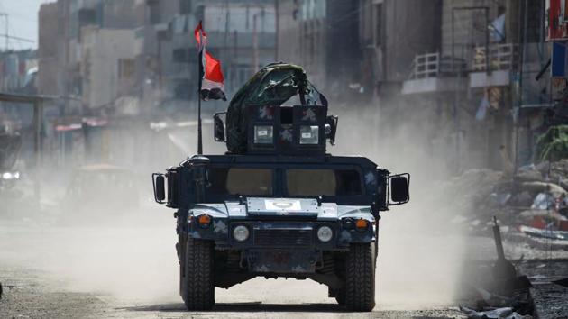A military vehicle of Federal police drives in the street during clashes between Iraqi forces and Islamic State militants, in Mosul, Iraq March 24, 2017. (REUTERS Photo) A military vehicle of Federal police drives in the street during clashes between Iraqi forces and Islamic State militants, in Mosul, Iraq March 24, 2017. (REUTERS Photo)