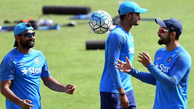 Virat Kohli (R) catches a ball during a training session on the eve of fourth Test against Australia. (AFP) Virat Kohli (R) catches a ball during a training session on the eve of fourth Test against Australia. (AFP)