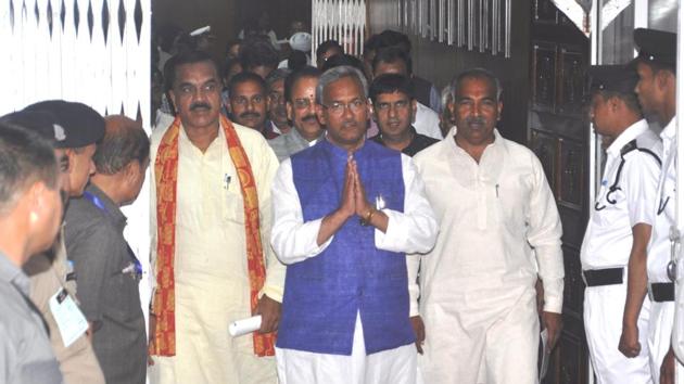 Chief Minister Trivendra Singh Rawat comes out after attending the first day of the interim budget session of Uttarakhand assembly in Dehradun on Friday. (Vinay Santosh Kumar/HT Photo) Chief Minister Trivendra Singh Rawat comes out after attending the first day of the interim budget session of Uttarakhand assembly in Dehradun on Friday. (Vinay Santosh Kumar/HT Photo)