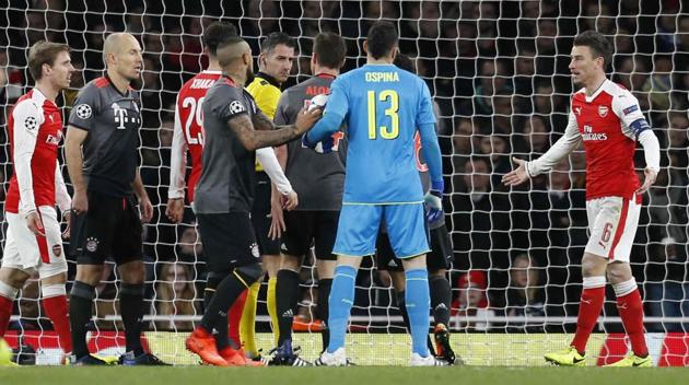 Arsenal and Bayern Munich have both been fined by UEFA for the behaviour of their fans during their Champions League Round of 16 clash.(AFP)