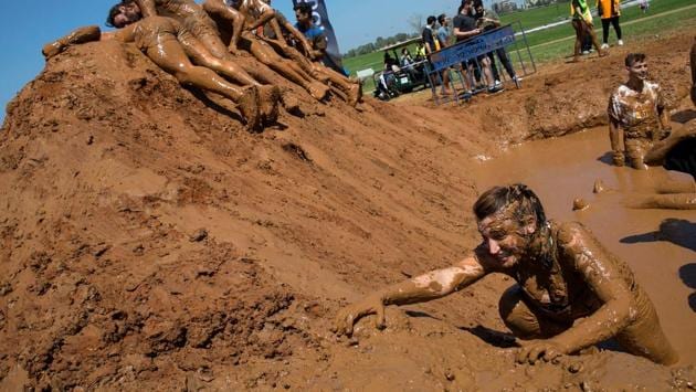 No fine chocolate on the menu but a deliciously thick mud and immense pride at crossing the finish line, a statement said (Baz Ratner/Reuters)