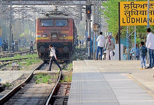 A man crossing railway line even as a train is approaching in Ludhiana on Friday. (Jagtinder Singh Grewal/HT Photo) A man crossing railway line even as a train is approaching in Ludhiana on Friday. (Jagtinder Singh Grewal/HT Photo)