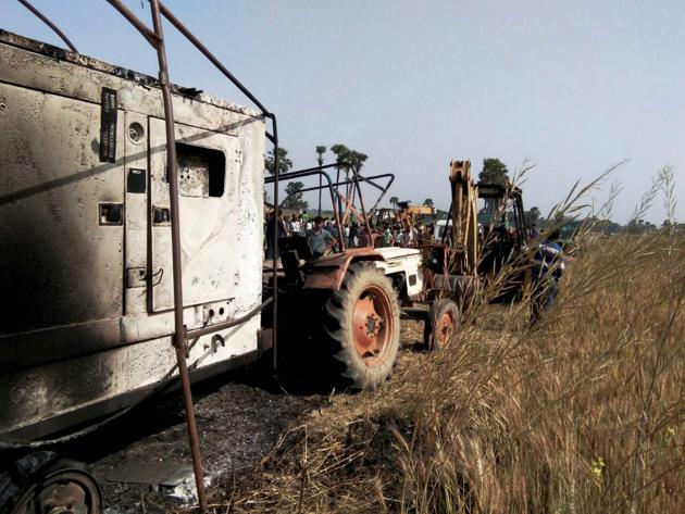Charred agricultural vehicles which were burnt by the Maoists at Jayanagar village in Gaya district of Bihar.(PTI)