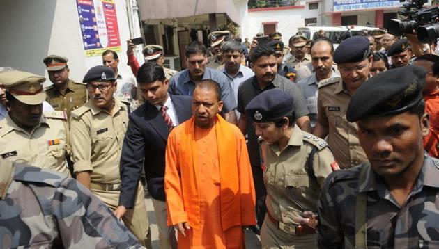 Uttar Pradesh Chief Minister Aditya Nath Yogi on Friday visited a gang-rape and acid-attack survivor at a hospital here who was allegedly forced to drink acid by two men . (HT Photo) Uttar Pradesh Chief Minister Aditya Nath Yogi on Friday visited a gang-rape and acid-attack survivor at a hospital here who was allegedly forced to drink acid by two men . (HT Photo)