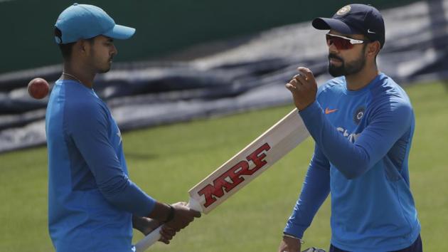 Virat Kohli is nursing a shoulder injury going into the fourth Test match against Australia in Dharamsala. (AP) Virat Kohli is nursing a shoulder injury going into the fourth Test match against Australia in Dharamsala. (AP)