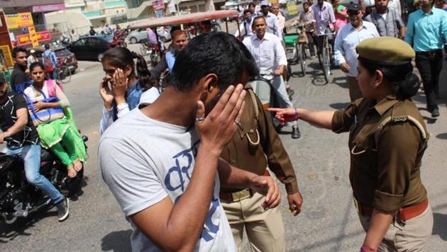 Police question men outside Meerut’s RGPG College for Women on Wednesday. ‘Anti-Romeo squads’ were one of the key election promises of Uttar Pradesh chief minister Yogi Adityanath. (Chahatram/HT photo) Police question men outside Meerut’s RGPG College for Women on Wednesday. ‘Anti-Romeo squads’ were one of the key election promises of Uttar Pradesh chief minister Yogi Adityanath. (Chahatram/HT photo)