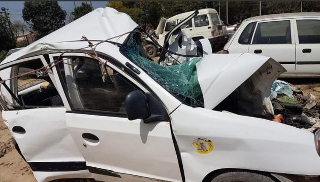 Mangled remains of the car involved in the accident on the NH­64 near Barnala on Saturday.(HT Photo)