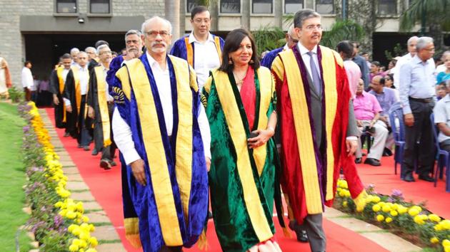 For the albums: (From left) IIMB director Prof G Raghuram; chairperson, IIMB Board of Governors Kiran Mazumdar-Shaw and chief guest Uday Kotak, MD, Kotak Mahindra Bank Limited, lead the convocation procession . Behind them is Sonjoy Chatterjee, member of the IIMB Board of Governors and chairman and co-CEO of Goldman Sachs (India) with fellow Board members and IIMB faculty. (Handout) For the albums: (From left) IIMB director Prof G Raghuram; chairperson, IIMB Board of Governors Kiran Mazumdar-Shaw and chief guest Uday Kotak, MD, Kotak Mahindra Bank Limited, lead the convocation procession . Behind them is Sonjoy Chatterjee, member of the IIMB Board of Governors and chairman and co-CEO of Goldman Sachs (India) with fellow Board members and IIMB faculty. (Handout)