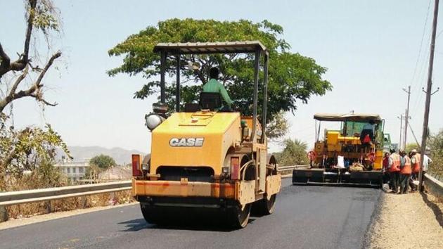 A first in Maharashtra, PWD constructs Palghar road using pinewood ...