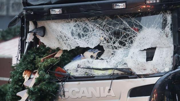 Christmas decoration are stuck in the smashed window of the cabin of a truck which ran into a crowded Christmas market in Germany on Dec 19, 2016. (AP File Photo) Christmas decoration are stuck in the smashed window of the cabin of a truck which ran into a crowded Christmas market in Germany on Dec 19, 2016. (AP File Photo)