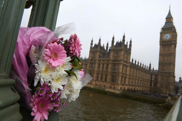 Flowers are placed at the Westminster Bridge. (AFP) Flowers are placed at the Westminster Bridge. (AFP)