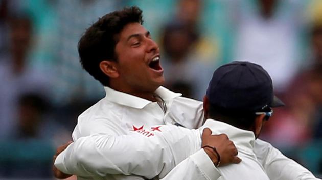 India's Kuldeep Yadav and Murali Vijay celebrate the dismissal of Australia's Peter Handscomb on Day 1 of the fourth Test in Dharamsala.(REUTERS)