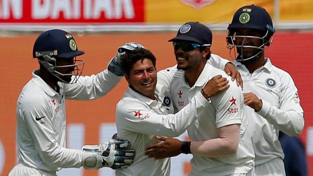 Kuldeep Yadav celebrates the dismissal of Australia's Glenn Maxwell with his teammates on the first day of the fourth Test in Dharamsala on Saturday.(REUTERS)