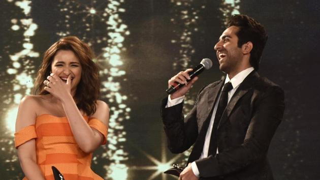 We’ll see them together in an upcoming film, and here are actors Parineeti Chopra and Ayushmann Khurrana lighting up the stage at the style awards.  (Satish Bate/HT Photo) 