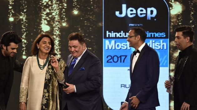 Actors Neetu Singh and Rishi Kapoor share a laugh on stage, as they are celebrated for their style.     (Satish Bate/HT Photo) 