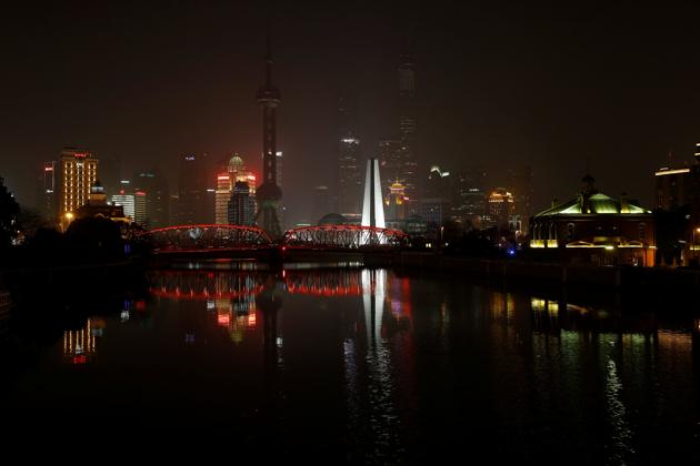The Bund on the banks of the Huangpu River is pictured during Earth Hour in Shanghai, China. (Aly Song/ REUTERS)
