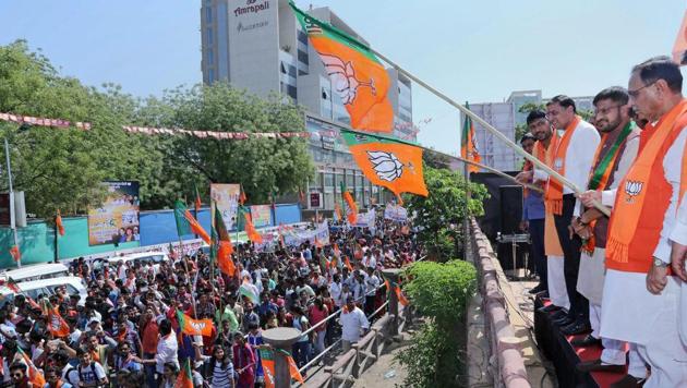 Gujarat chief minister Vijay Rupani flags off the traditional march on the occasion of 'Shahid Divas' in Ahmedabad on Thursday. BJP looks to revive Hindutva to retain its hold in Gujarat. (PTI) Gujarat chief minister Vijay Rupani flags off the traditional march on the occasion of 'Shahid Divas' in Ahmedabad on Thursday. BJP looks to revive Hindutva to retain its hold in Gujarat. (PTI)