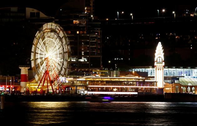 The rides at Luna Park seen before the tenth anniversary of Earth Hour in Sydney, Australia. (David Gray / REUTERS)