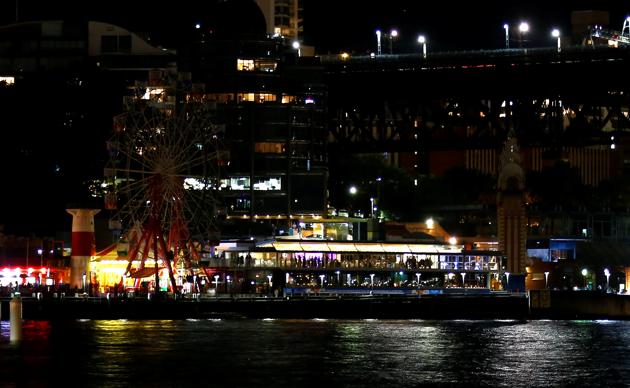 The rides at Luna Park seen during the tenth anniversary of Earth Hour in Sydney, Australia. (David Gray / REUTERS)