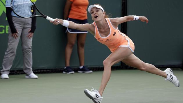 Agnieszka Radwanska hits a return to Mirjana Lucic-Baroni during a Miami Open.(AP)