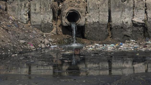 A drain opens into the river at Bharat Nagar.  (Satish Bate/HT Photo) 
